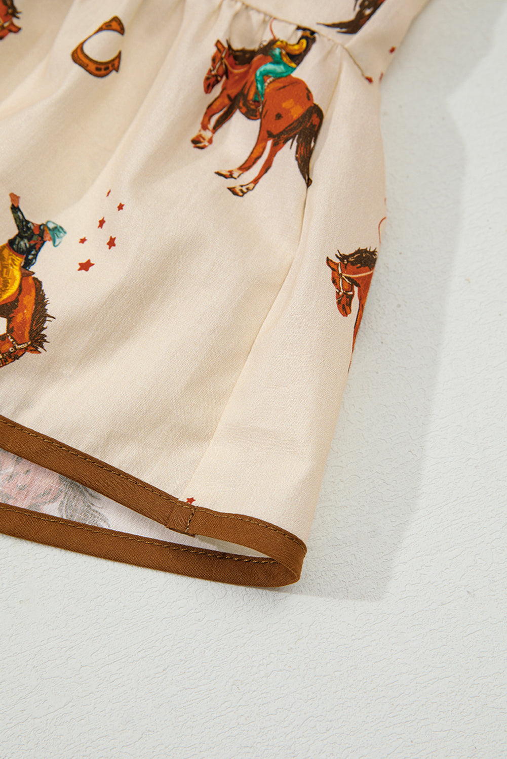 Apricot Rodeo Print Peplum Top