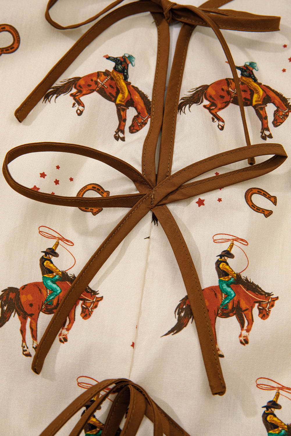 Apricot Rodeo Print Peplum Top